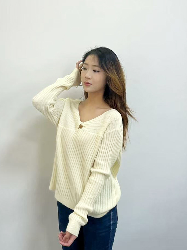 Hollowed-out knitted sweater